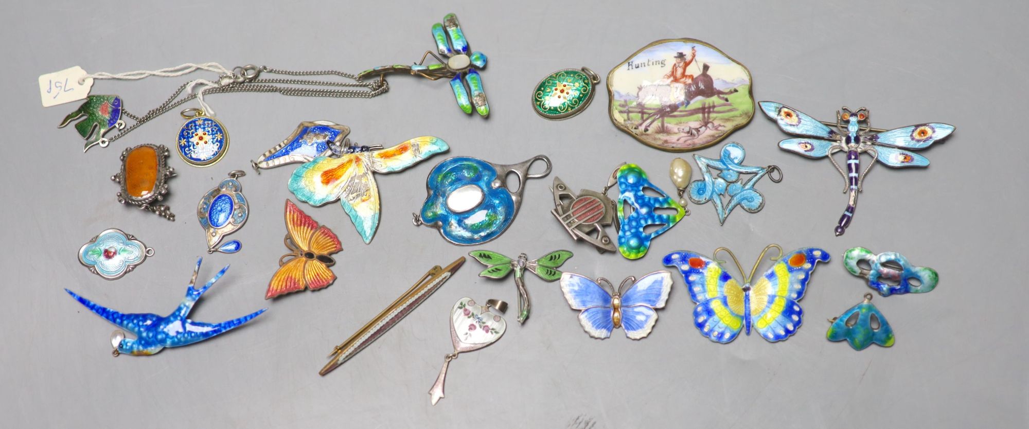 A mixed group of enamelled jewellery.